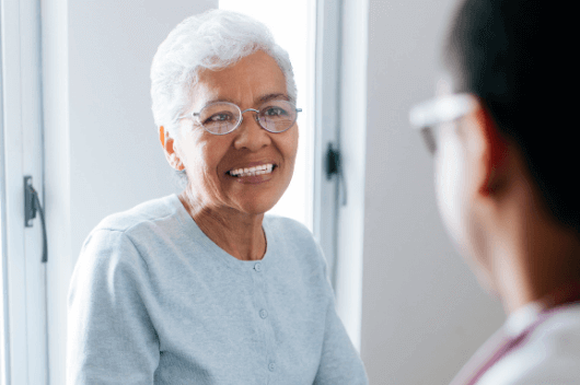 An older woman smiling